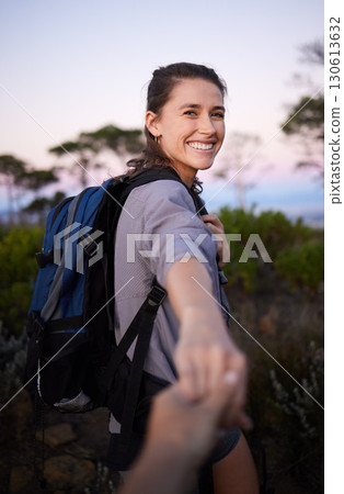 Hiking, holding hands and portrait of woman on mountain for adventure, freedom and journey in nature. Fitness, dating and happy girl with partner for walking, trekking and travel lifestyle on hike 130613632