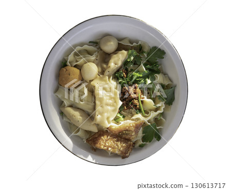 Flat egg noodles (Dried Mee Pok) served with Crispy pork belly, Shrimp wontons, Fish balls, Shrimp balls and Coriander sprinkled with Fried garlic. Flat egg noodles (Dried Mee Pok) served with Crispy pork belly, Shrimp wontons, Fish balls, Shrimp balls and Coriander sprinkled with Fried garlic. 130613717