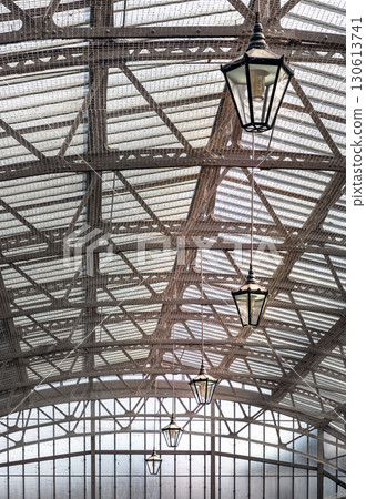 The vintage iron glass roof with Lamps on the ceiling of Windsor Royal Shopping complex. 130613741