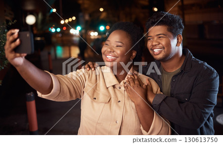 Couple of friends, phone or night selfie on city street or road for social media, profile picture or birthday celebration vlog. Smile, happy or bonding people on mobile photography technology in dark Couple of friends, phone or night selfie on city street or road for social media, profile picture or birthday celebration vlog. Smile, happy or bonding people on mobile photography technology in dark 130613750
