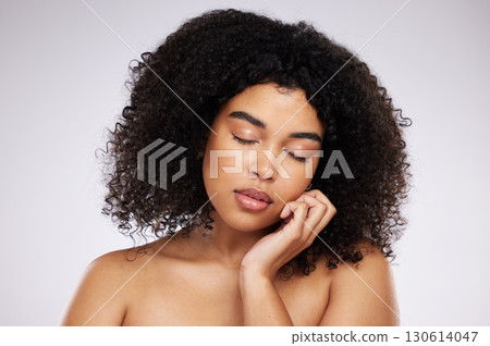 Skincare, cosmetics and black woman with eyes closed and hand on face, afro and advertising luxury makeup product promo. Dermatology, beauty and facial care on model isolated on studio background. 130614047