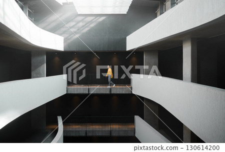 Architecture, lighting and walking woman in a building for work, entrepreneurship and start of job. Design, professional and designer on a walk in the corridor of an elegant and modern workplace Architecture, lighting and walking woman in a building for work, entrepreneurship and start of job. Design, professional and designer on a walk in the corridor of an elegant and modern workplace 130614200