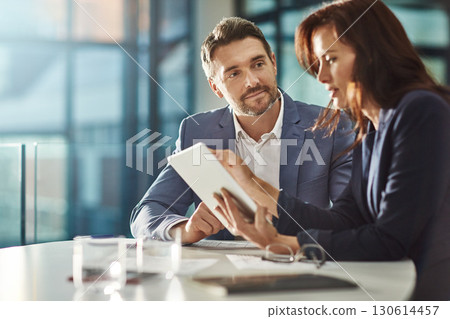 Tablet, teamwork meeting and business people in office workplace. Collaboration, technology and man, woman or employees with touchscreen planning sales, research or financial strategy in company. 130614457