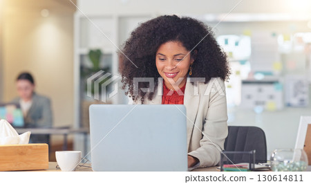 Business woman, office and laptop for project, copywriting and social media research at marketing agency. Happy african person, worker or writer on computer in creative workspace for company proposal 130614811