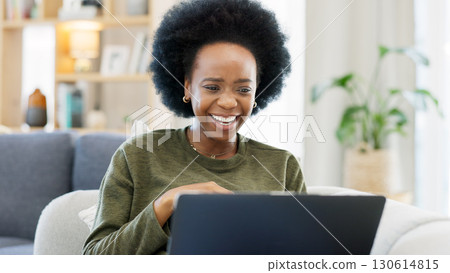 Woman, laptop and laugh on sofa for movies, social media and watch subscription to internet show at home. Happy african person, computer and streaming funny comedy, multimedia and crazy meme on blog 130614815