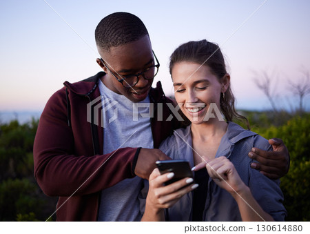 Hiking, travel and couple with phone on mountain for location, gps mobile app and health tracking. Fitness, dating and interracial man and woman with smartphone for adventure, freedom and nature hike Hiking, travel and couple with phone on mountain for location, gps mobile app and health tracking. Fitness, dating and interracial man and woman with smartphone for adventure, freedom and nature hike 130614880