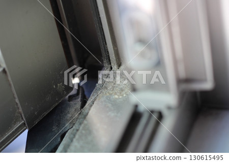 Dust, dirt, accumulated dirt on window sashes 130615495