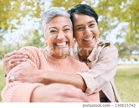 Couple of friends, seniors and portrait hug in nature park, grass garden and relax environment for profile picture. Smile, happy women and bonding retirement elderly in love embrace for social media 130615742
