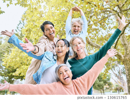 Senior retirement, portrait and hands up in fun game, goofy activity or silly energy for comic profile picture on social media. Smile, happy women and diversity elderly friends in nature park bonding Senior retirement, portrait and hands up in fun game, goofy activity or silly energy for comic profile picture on social media. Smile, happy women and diversity elderly friends in nature park bonding 130615765