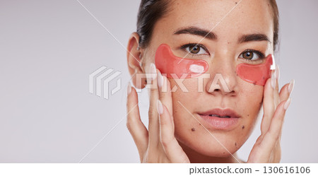 Skincare, face portrait and woman with eye patches in studio isolated on a gray background mock up. Dermatology, cosmetics and female model with facial pads or products for beauty or skin treatment. 130616106