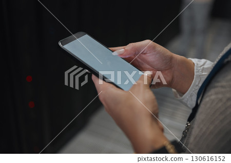 Phone screen, mockup or IT woman hands in data center on research, communication or typing in server room. Scroll, search or girl on smartphone for networking, social media or reading website content Phone screen, mockup or IT woman hands in data center on research, communication or typing in server room. Scroll, search or girl on smartphone for networking, social media or reading website content 130616152