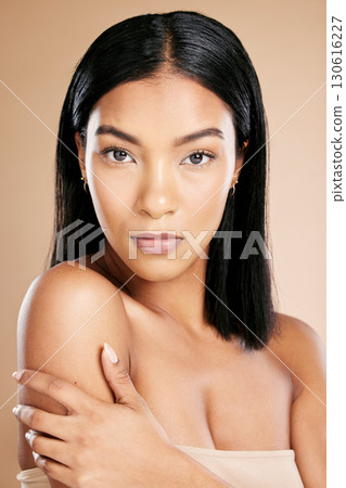 Woman, studio portrait and skincare with makeup, natural aesthetic and healthy cosmetic glow by beige background. Model, facial beauty and cosmetics with radiant skin, face and wellness for self love Woman, studio portrait and skincare with makeup, natural aesthetic and healthy cosmetic glow by beige background. Model, facial beauty and cosmetics with radiant skin, face and wellness for self love 130616227