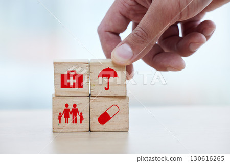 Family, healthcare and hand with blocks for insurance, medical future and investment in health. Medicine, safety and doctor building a hospital plan for security, service and trust in pharmacy Family, healthcare and hand with blocks for insurance, medical future and investment in health. Medicine, safety and doctor building a hospital plan for security, service and trust in pharmacy 130616265