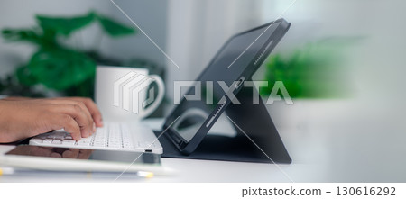 Remote Work and Digital Workspace with Tablet and Keyboard 130616292