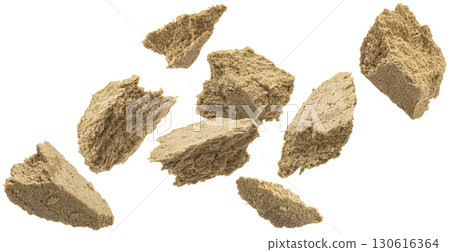 Halva pieces falling isolated on white background, copy space, full depth of field Halva pieces falling isolated on white background, copy space, full depth of field 130616364