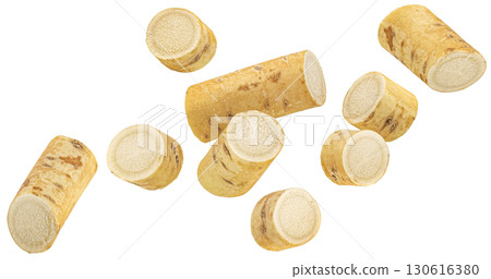 Falling horseradish root slices isolated on white background with clipping path, full depth of field 130616380