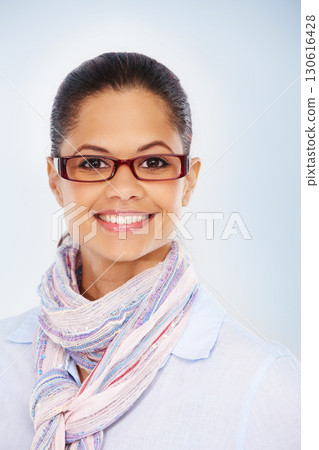 Portrait, glasses and mockup with a black woman in studio on a gray background for vision or prescription lenses. Face, eyewear and fashion with a young female posing for optometry or eye care 130616428