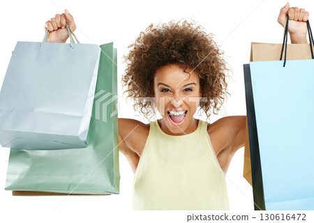 Shopping, retail and black woman customer excited with sale or deal isolated against a studio white background. Portrait of happy, fashion and joyful winner celebrating holding bags at a giveaway Shopping, retail and black woman customer excited with sale or deal isolated against a studio white background. Portrait of happy, fashion and joyful winner celebrating holding bags at a giveaway 130616472
