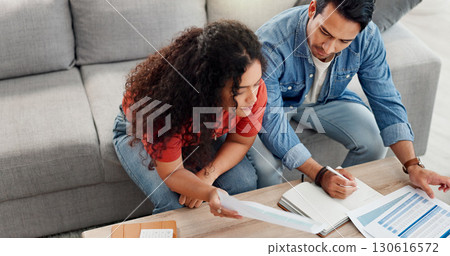 Above, couple and writing with document at house for finance planner, review budget and bills invoice. People, paperwork and application for home insurance, mortgage expenses and reminder for payment Above, couple and writing with document at house for finance planner, review budget and bills invoice. People, paperwork and application for home insurance, mortgage expenses and reminder for payment 130616572