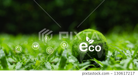 Green eco globe with sustainability icons on grass field, symbolizing renewable energy, recycling, environmental conservation, and eco-friendly lifestyle for future generations. 130617217