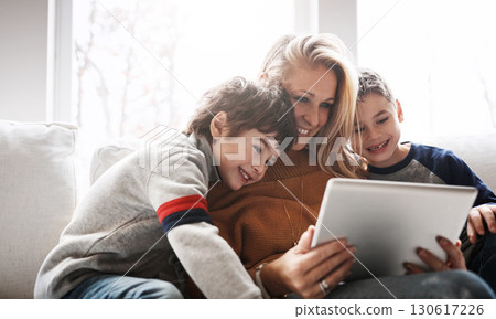 Relax, tablet and mom with children on sofa bonding, quality time and streaming movies on weekend. Love, family home and mom and kids with digital tech for online games, learning and internet app 130617226