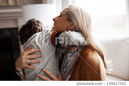 Mother, sofa and boy child with hug, love and comfort in happy care in home living room. Happy family together, couch and kid with mama, embrace and smile for support, bonding and happiness in Madrid Mother, sofa and boy child with hug, love and comfort in happy care in home living room. Happy family together, couch and kid with mama, embrace and smile for support, bonding and happiness in Madrid 130617242