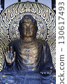 Buddha statue in the decorated temple of Angkor Wat 130617493