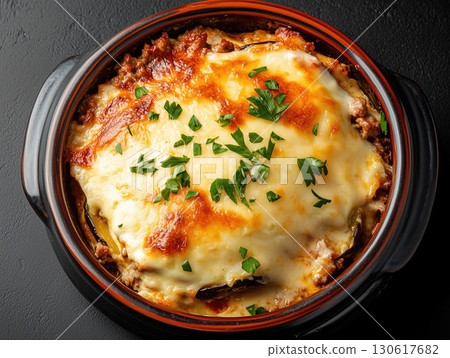 Moussaka with layers of eggplant, ground lamb, and bechamel sauce 130617682