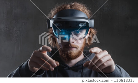Realistic photo of mixed reality headset in hands, immersive view 130618333