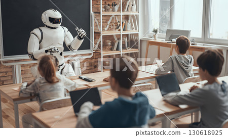 Futuristic AI-powered classroom with robotic assistant helping students study Futuristic AI-powered classroom with robotic assistant helping students study 130618925
