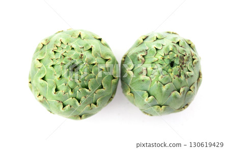 two ripe artichokes on white background two ripe artichokes on white background 130619429
