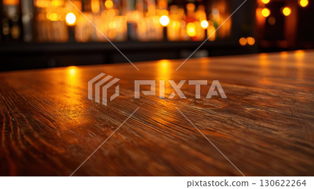 close up of weathered wooden tabletop with warm lighting in bar setting, creating cozy atmosphere close up of weathered wooden tabletop with warm lighting in bar setting, creating cozy atmosphere 130622264