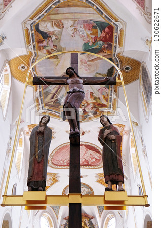 Virgin Mary and Saint John under the cross in the monastery church of St. John in Ursberg, Germany 130622671