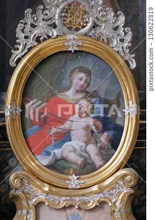 Virgin Mary with baby Jesus, altarpiece in the monastery church of St. John in Ursberg, Germany 130622819
