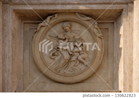 Charity Medallion on the Palazzo Montecitorio, seat of the Italian Chamber of Deputies in Rome, Italy 130622823