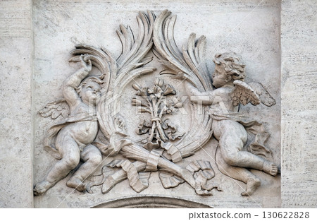 Angels with symbols of martyrdom on the portal of Sant Andrea della Valle Church in Rome, Italy Angels with symbols of martyrdom on the portal of Sant Andrea della Valle Church in Rome, Italy 130622828