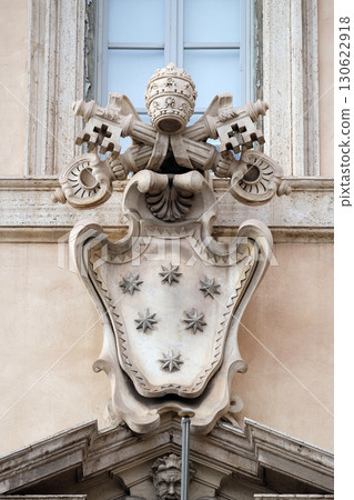 Papal coat of arms, facade of the Church of the Gesu, mother church of the Society of Jesus, Rome, Italy Papal coat of arms, facade of the Church of the Gesu, mother church of the Society of Jesus, Rome, Italy 130622918