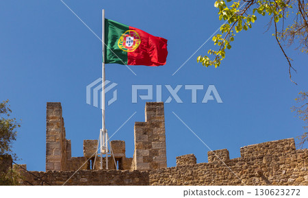 Portugal Flag on Fortress Wall in Lisbon, Portugal 130623272
