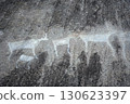 Ancient petroglyphs of deer carvings on rock surface, prehistoric art near Belomorsk in Karelia, Russia 130623397