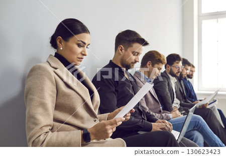 Candidates waiting for their turn to job interviews Candidates waiting for their turn to job interviews 130623423