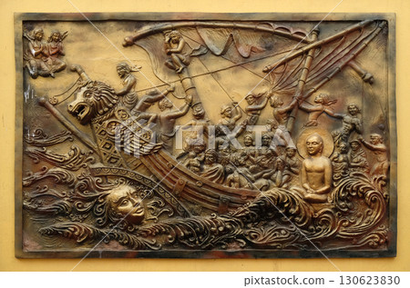 Soul itself is the strongest power; Sudamstra, a serpent-prince, creates a heavy storm in the river, but fails, Street bass relief on the wall of Jain Temple (also called Parshwanath Temple) in 130623830