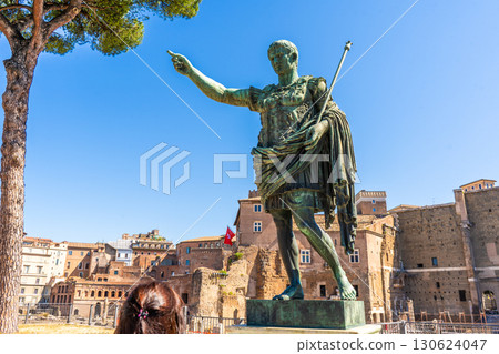Emperor Augustus points his finger where to go. Statue in Rome Italy monument 130624047