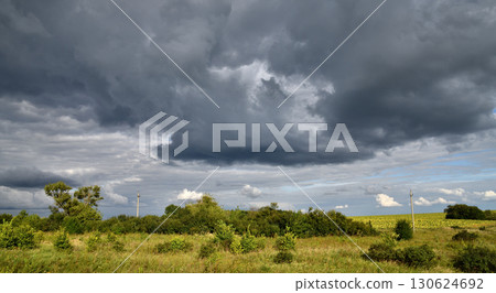 Rural landscape with stormy sky, Russia Rural landscape with stormy sky, Russia 130624692