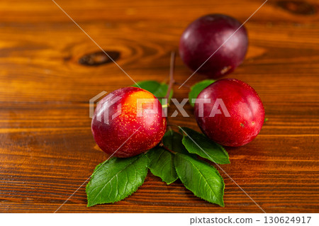 Organic farm plums close-up with space for text Organic farm plums close-up with space for text 130624917