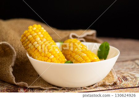 close-up of juicy corn in a white plate close-up of juicy corn in a white plate 130624926