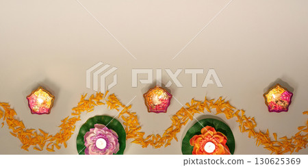 Diwali Decor. Elegant Arrangement of Diyas and Marigold Flowers for Festival of Lights Diwali Decor. Elegant Arrangement of Diyas and Marigold Flowers for Festival of Lights 130625369