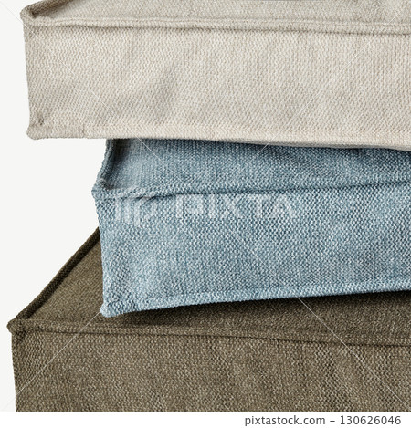 Stack of soft furnishing square cushions in natural colors Stack of soft furnishing square cushions in natural colors 130626046