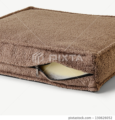 Brown cushion cover showing foam insert and zipper closure 130626052