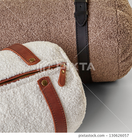 Two stylish teddy fabric bags with leather straps and brass zippers 130626057