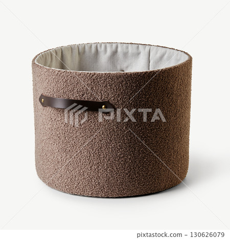 Empty modern cylinder shaped boucle storage basket with leather handle Empty modern cylinder shaped boucle storage basket with leather handle 130626079